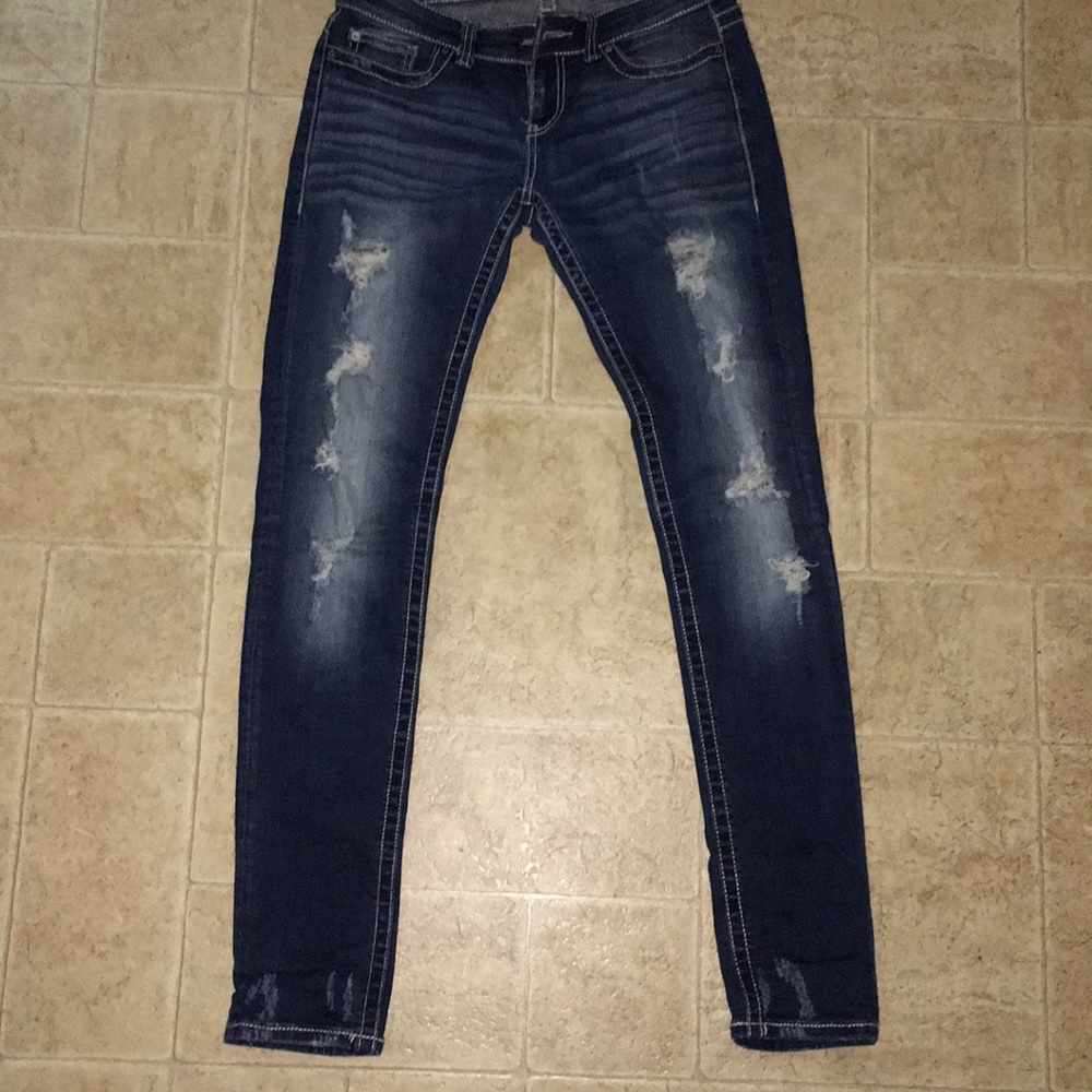 Buckle distressed skinny jean